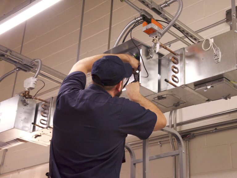 Man repairing HVACR systems