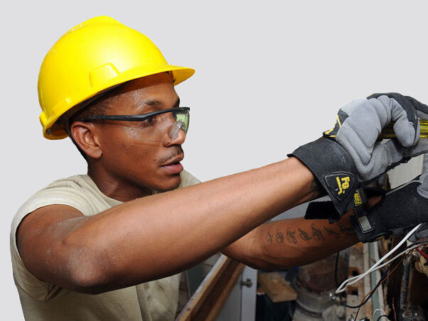 Electrician with yellow hardhat