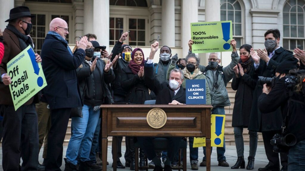 Mayor Bill DeBlasio signs Local Law 154