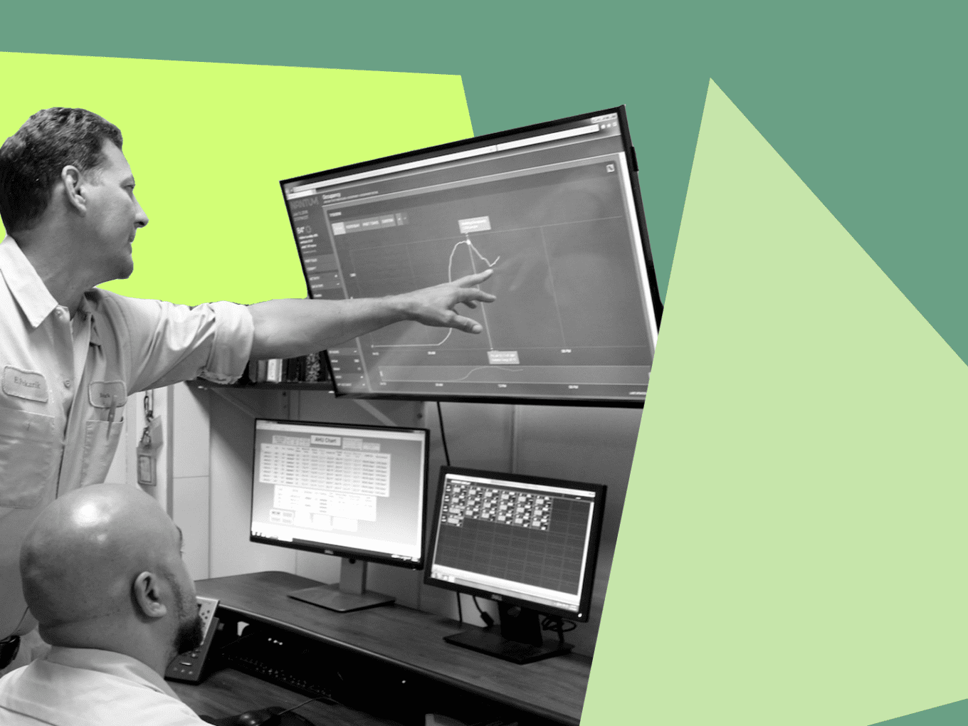 Two men looking at computer screen