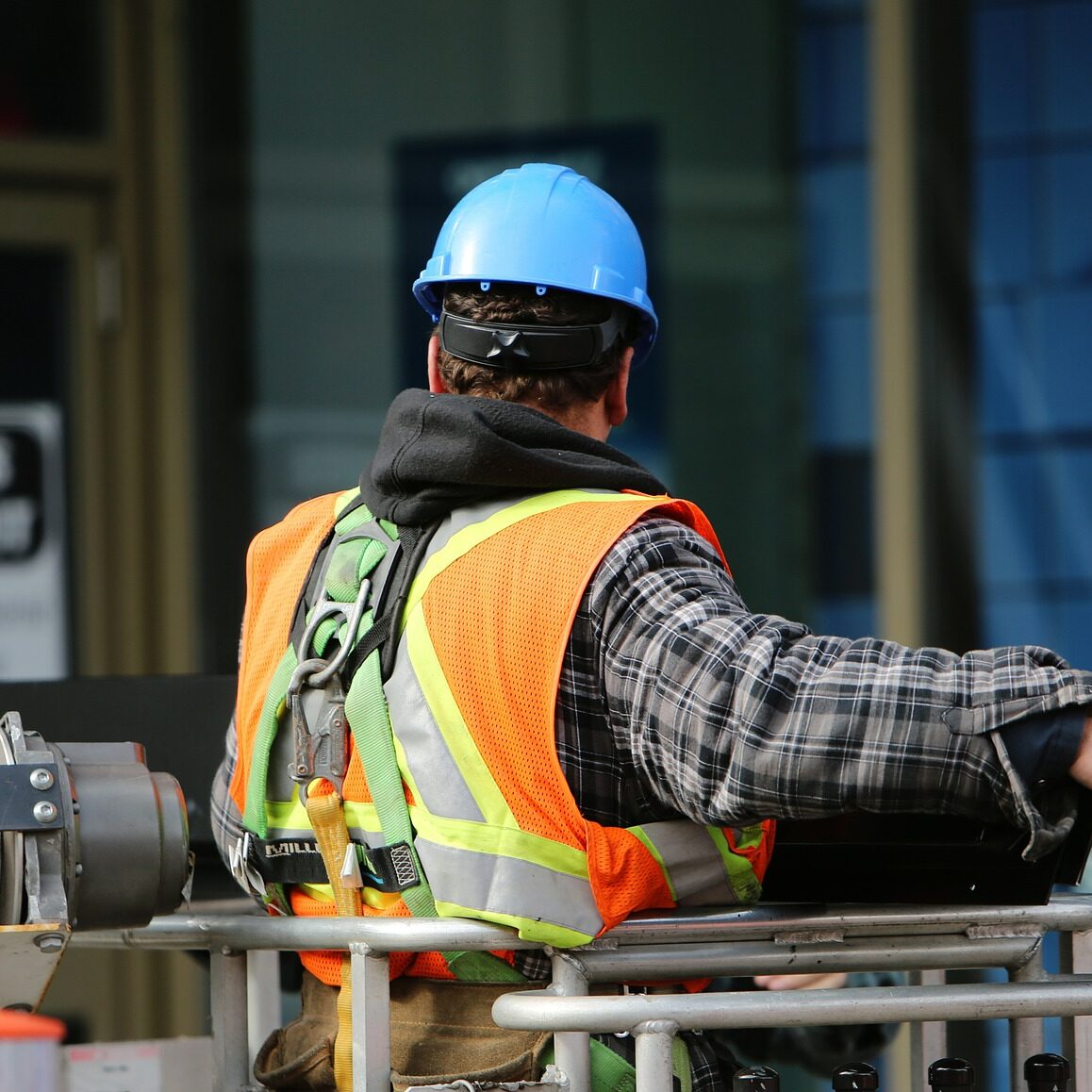 Construction worker in orange vest