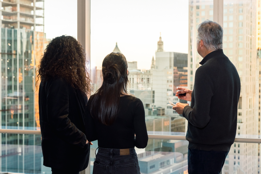 People looking out of window