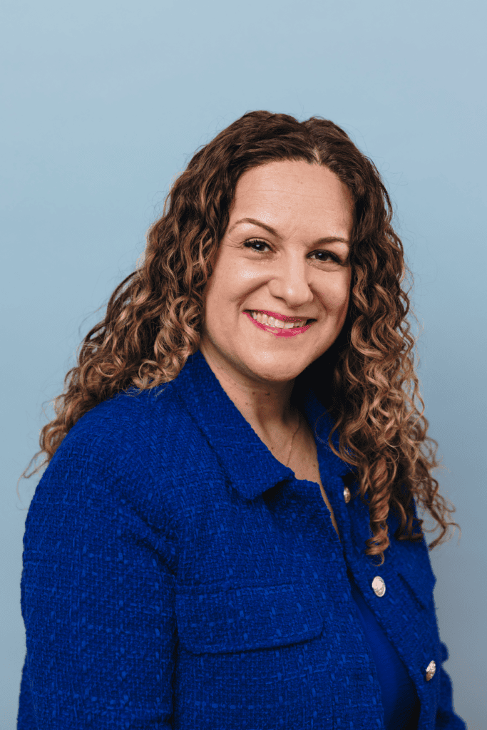 Headshot photo of Hrisa Gatzoulis, Vice President and Head of Sustainability at Rudin. 